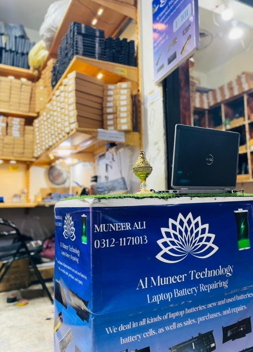 Technician repairing laptop